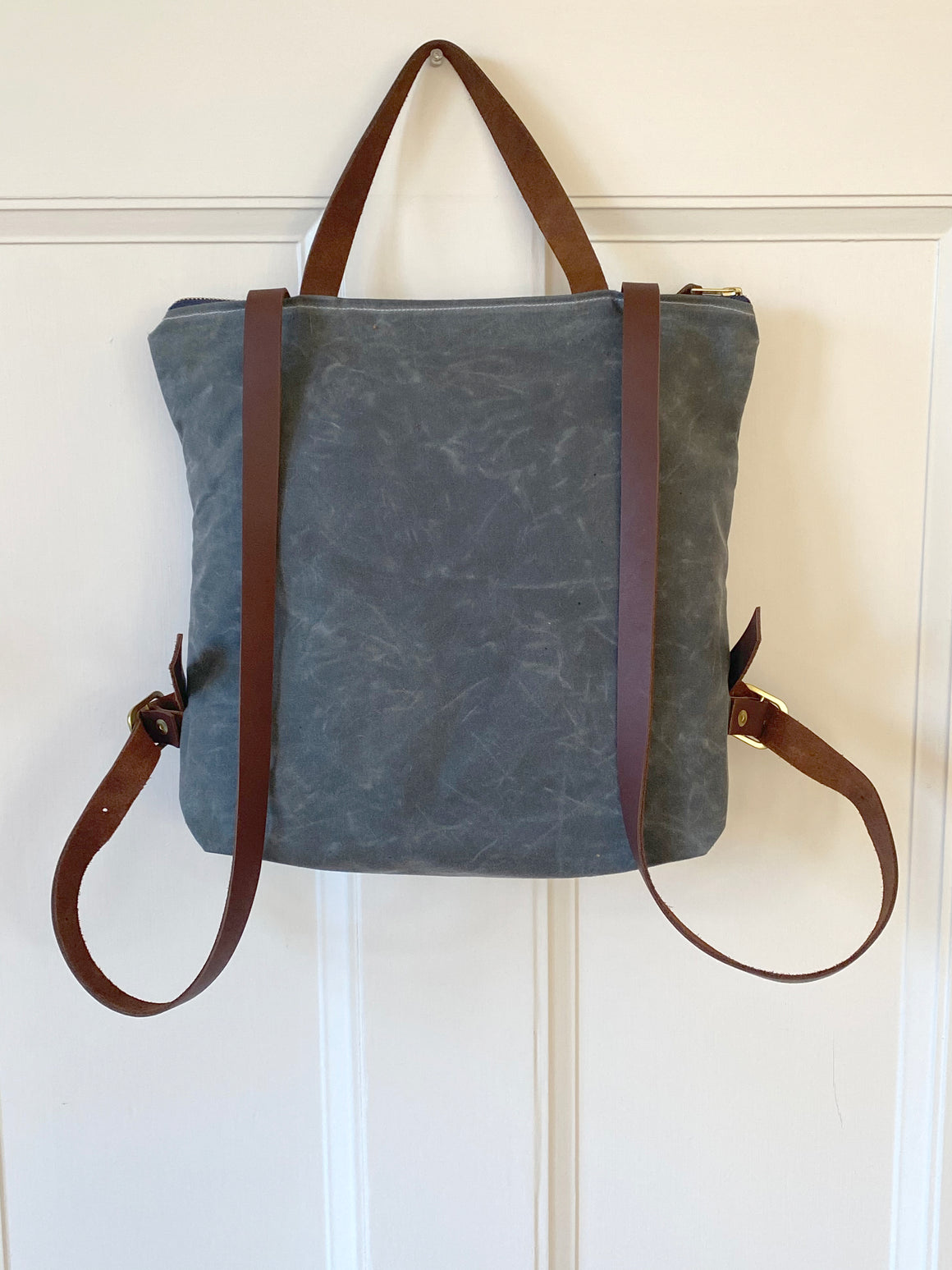Tofino Backpack front view – handcrafted waxed canvas backpack with Pendleton wool design.